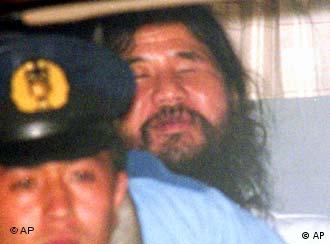 Shoko Asahara, the leader of the Aum Shinri Kyo cult, is on death row - 0,,1124692_4,00