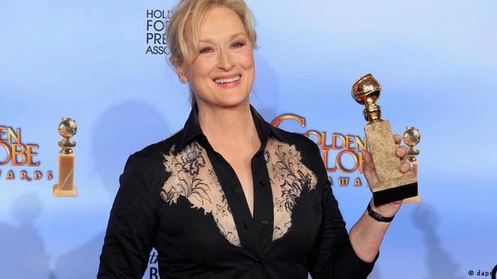 Streep poses with her Golden Globe for Best Performance by an Actress in a motion picture - drama for "The Iron Lady"