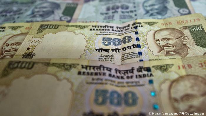 A file picture shows Indian Currency notes in New Delhi on December 7, 2011 [Photo: MANAN VATSYAYANA/AFP/Getty Images) 
