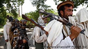 Taliban fighters hold their heavy and light weapons before surrendering them to Afghan authorities in Jalalabad, east of Kabul, Afghanistan
(AP Photo/Rahmat Gul, File) 