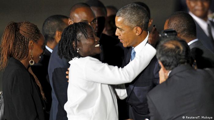 US President Barack Obama embraces his half-sister Auma on his arrival in Nairobi.