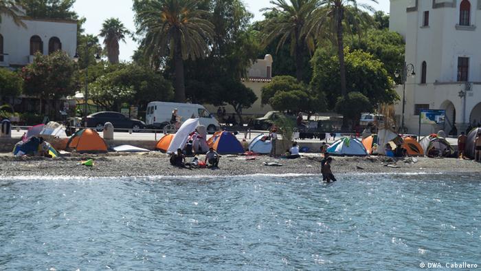 Refugees camp along the shores of Kos