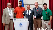The four train heroes meet the French president