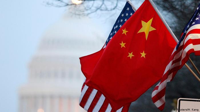 Chinese and US flag next to each other (photo: REUTERS/Hyungwon Kang/Files)