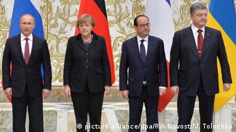 Канцлер ФРГ, президенты России, Франции и Украины после подписания Минских соглашений