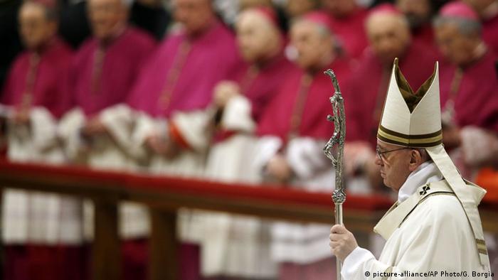 Pope Francis arrives to celebrate the Christmas Eve Mass in St. Peter's Basilica at the Vatican, Thursday, Dec. 24, 2015