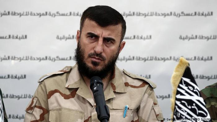 Zahran Allouch, the leader of Jaish al-Islam (Islam Army) and military leader of the Islamic Front, attends a press conference with other brigade leaders in the rebel-held Eastern Ghouta region outside the capital Damascus on August 27, 2014, to announce the fomation of The Unified Military Command of Eastern Ghouta
(Photo: ABD DOUMANY/AFP/Getty Images)