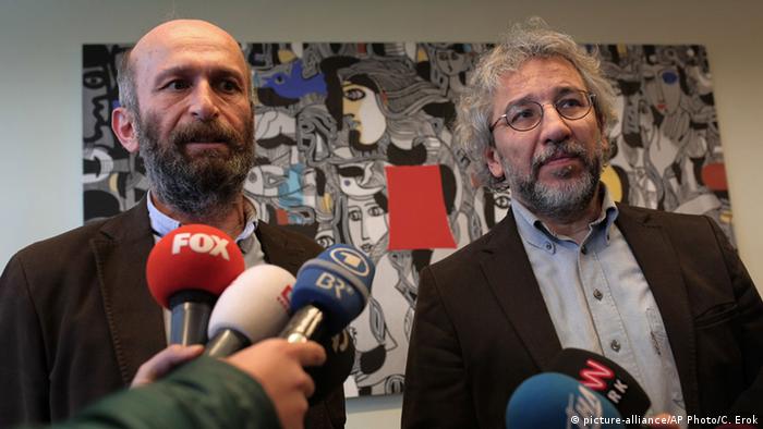 Can Dundar, the editor-in-chief of opposition newspaper Cumhuriyet, right, with Ankara representative Erdem Gul.