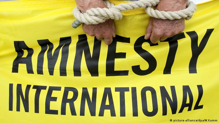 Amnesty international (picture-alliance/dpa/W.Kumm)