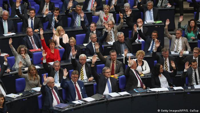 German politicians vote in the Bundestag