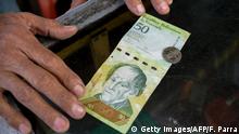 Venezuela 50 Bolivar Banknote und Münze