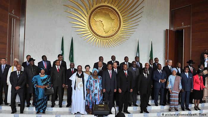 AU's heads of state and government gathered under the AU logo for a family picture.