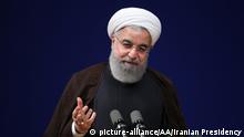 Iran Präsident Rohani zu U.S. Luftschlägen gegen syrischen Luftwaffenstützpunkt