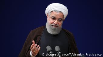 Iran Präsident Rohani zu U.S. Luftschlägen gegen syrischen Luftwaffenstützpunkt (picture-alliance/AA/Iranian Presidency)