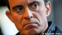 Manuel Valls, former French prime minister and presidential primary candidate, reacts during a campaign visit in Villeurbanne