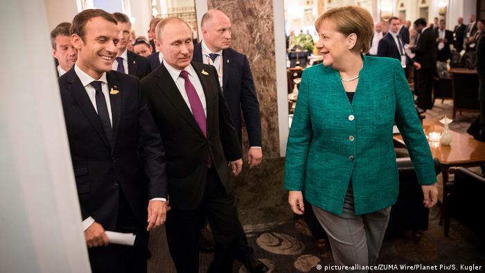 Deutschland G20 Emmanuel Macron, Wladimir Putin und Angela Merkel in Hamburg (picture-alliance/ZUMA Wire/Planet Pix/S. Kugler)