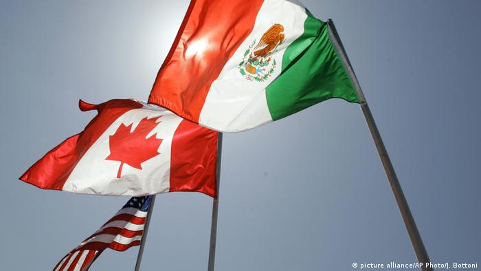   The flags of the United States, Canada and Mexico. 