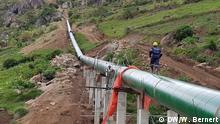 Uganda - Arbeiten am Bau eines Wasserkraftwerks am Fluss Lubilia (DW/W. Bernert)