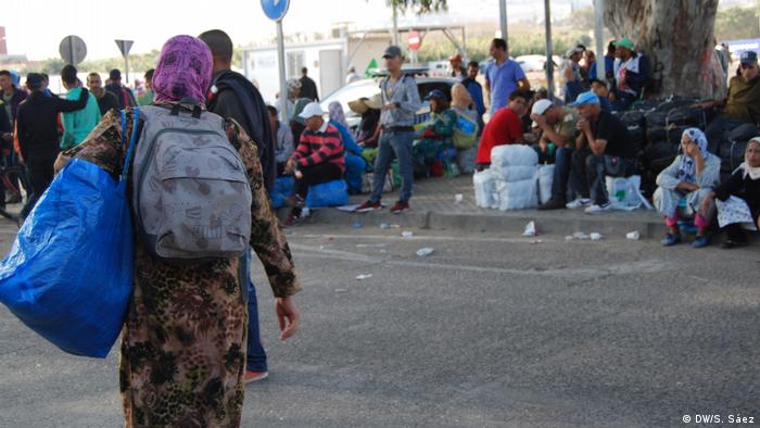 A group of refugees from Maghreb wait to cross the Melilla border