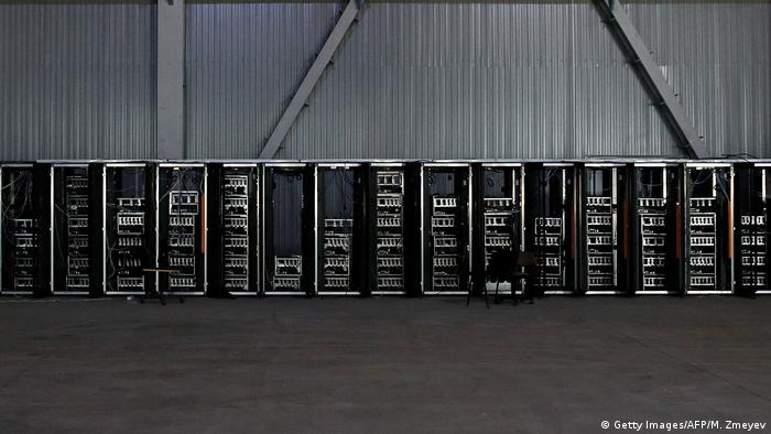 A bitcoin mine in Russia, run out of a former Soviet-era car factory warehouse (Getty Images/AFP/M. Zmeyev)
