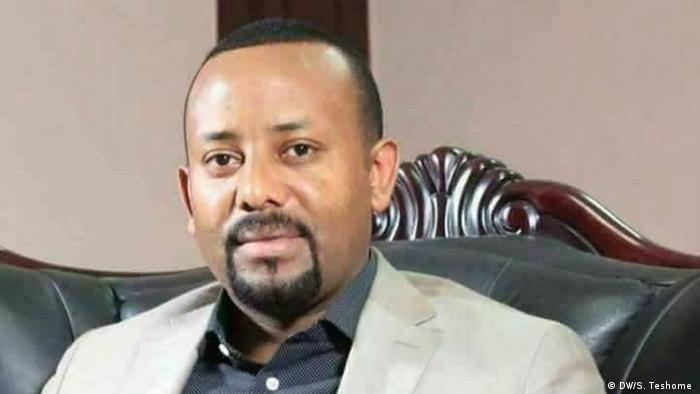 Dr. Abiy Ahmed wearing a white suit and dark shirt. (DW/S. Teshome )