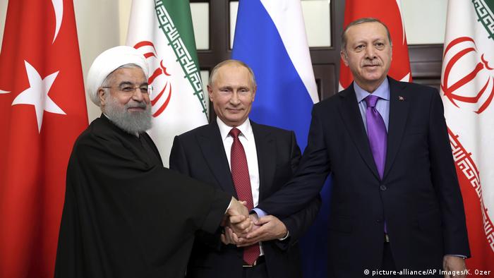 Russland | Präsidenten Erdogan, Putin und Rouhani (picture-alliance/AP Images/K. Ozer)