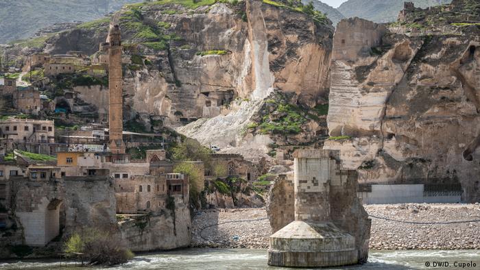 Damaged rock cliffs and earthworks in Hasankeyf, an ancient settlement in southeast Turkey being primed for flooding due to a nearby dam construction