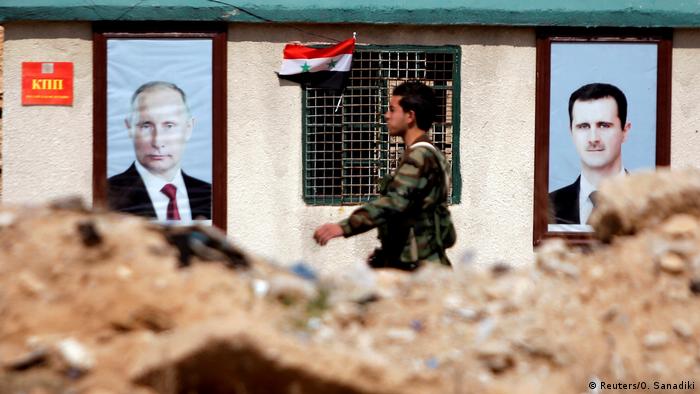 Портрети на Путин и Асад