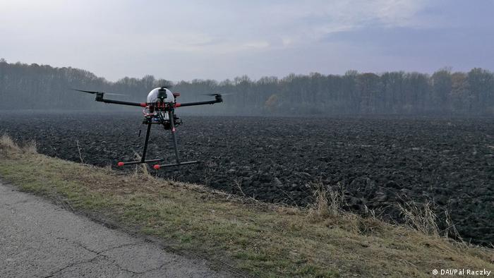 A drone flies over a field (DAI / Pál Raczky)