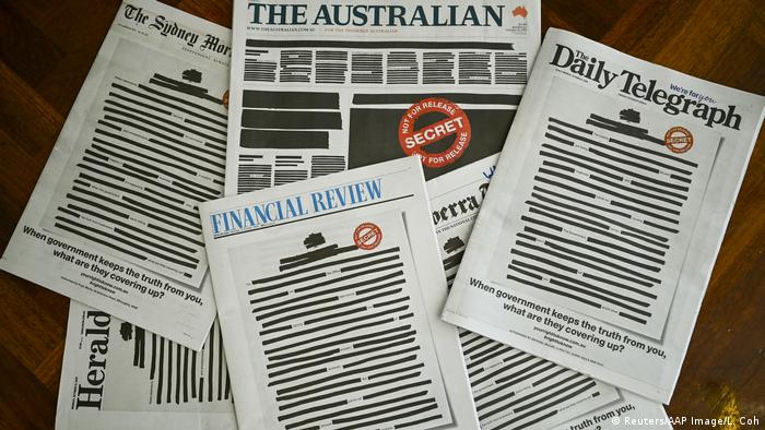 Front pages of major Australian newspapers show a 'Your right to know campaign, in Canberra, Australia, October 21, 2019. Australia's biggest newspapers ran front pages on Monday made up to appear heavily redacted to protest against recent legislation that restricts press freedoms, a rare show of unity by the usually tribal media industry. (Reuters/AAP Image/L. Coch)
