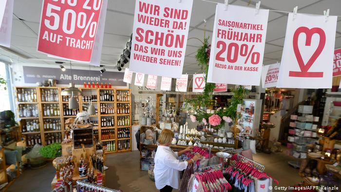 Baby Health in Winter A lifestyle store in Ludwigsburg, Saxony-Anhalt, welcomes customers again after the coronavirus lockdown in Germany with a banner and discounts. 