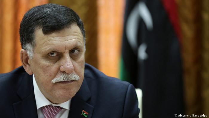 Libya's unity government's Prime Minister-designate Fayez al-Sarraj chairs a meeting of the presidential council with Tripoli municipal council in Tripoli, Libya, 31 March 2016