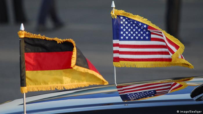 German and American Flag during the Arrival U.S. President BarackObama on the Airport Tegel (imago/Seeliger)