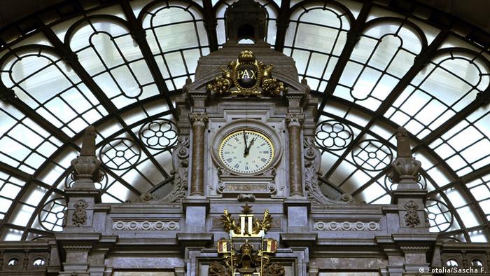 An Image of a clock at Antwerp Central Station 