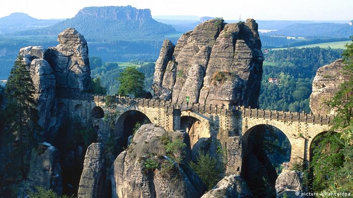Stone bridge leading across rock formations in Saxon Switzerland, Germany