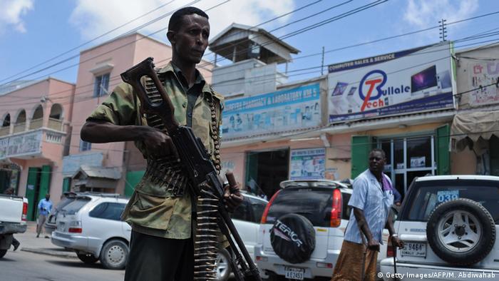 A Somali soldier patrols a street in Mogadishu