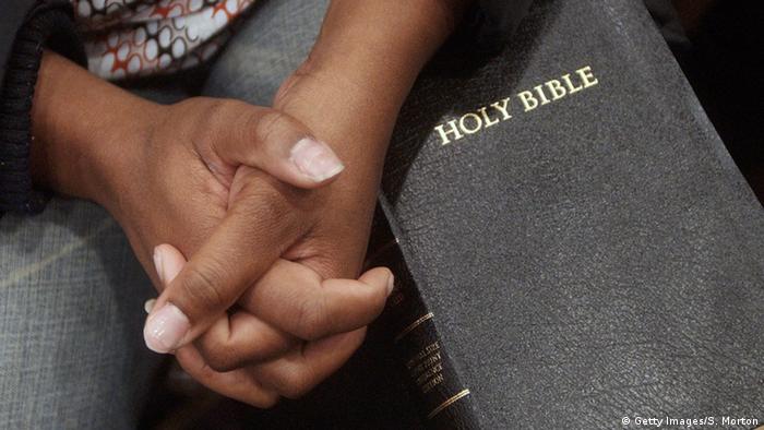 Hands on Bible (Getty Images/S. Morton)