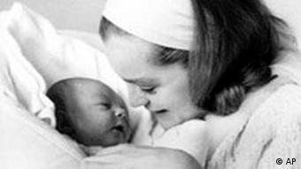 First photo of Romy Schneider and her newborn son Christoher in hospital, Dec. 1966.