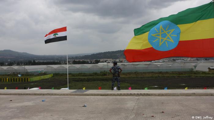 Ethiopia's national flag beside the Oromo regional flag