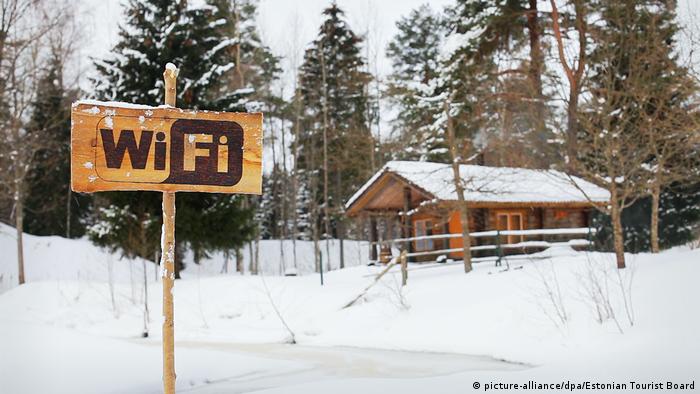 A Wifi sign next to a snowed in hut in Estonia