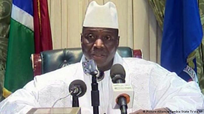 Yahya Jammeh speaks into microphones