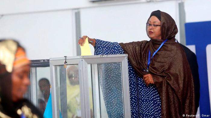 A Somali lawmaker casts her ballot (Reuters/F. Omar)