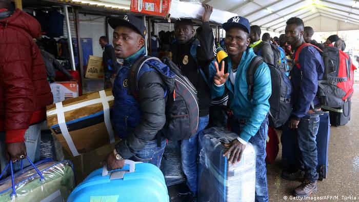 African immigrants from Ivory Coast in an airport in Tripoli, Libya (Getty Images/AFP/M. Turkia)