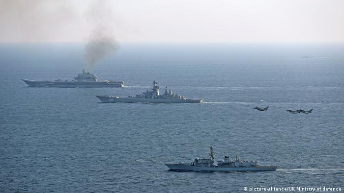 A frigate and planes of the British Armed Forces accompany the passage of Russian warships