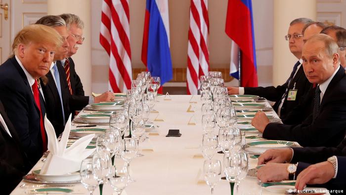 Trump and Putin at a working lunch in Helsinki (Reuters/K. Lamarque)