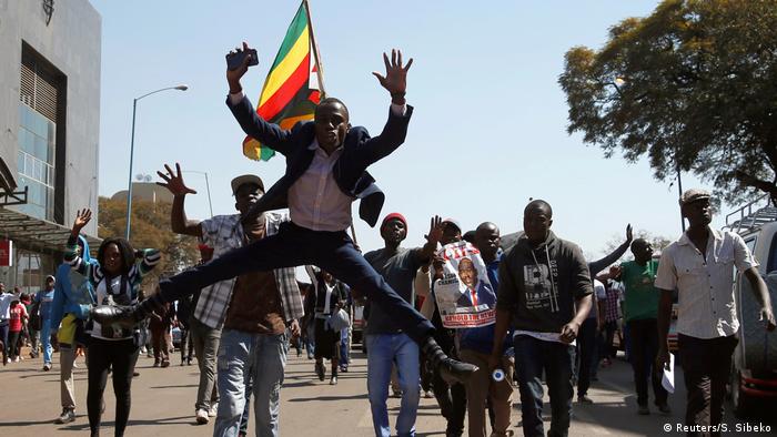 Supporters of Zimbabwe's opposition marching through the capital Harare 