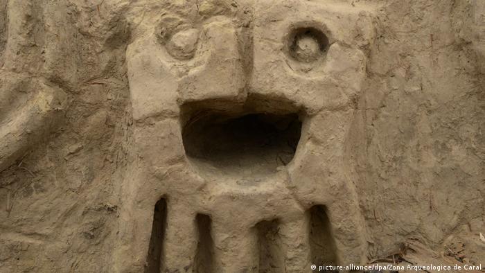 Wall carvings were found in what was once a fishing city of the Caral civilization, the oldest in the Americas. The relief is thought to symbolize a period of drought and famine brought on by climate change.