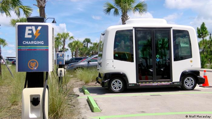  Self-driving bus at a green energy charging station