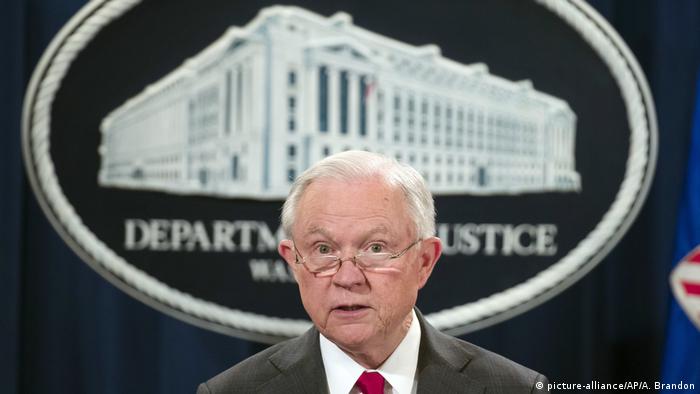  Attorney General Jeff Sessions pauses before speaking during a news conference at the Department of Justice in Washington. 