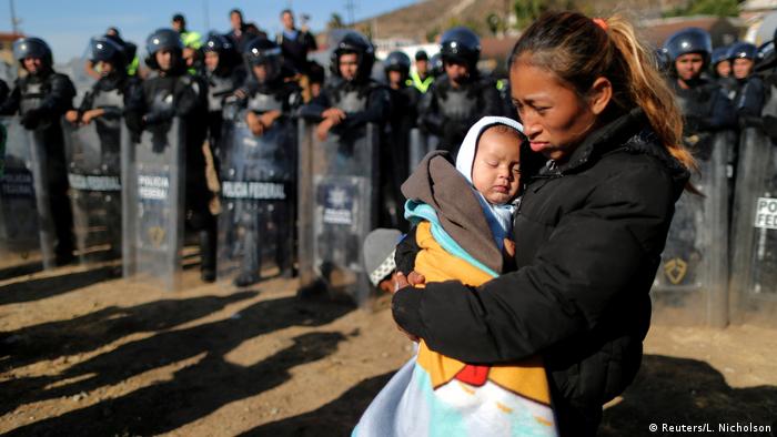 A woman and her baby at the border